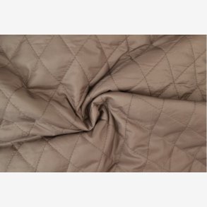 Quiltet foer stof mrk beige